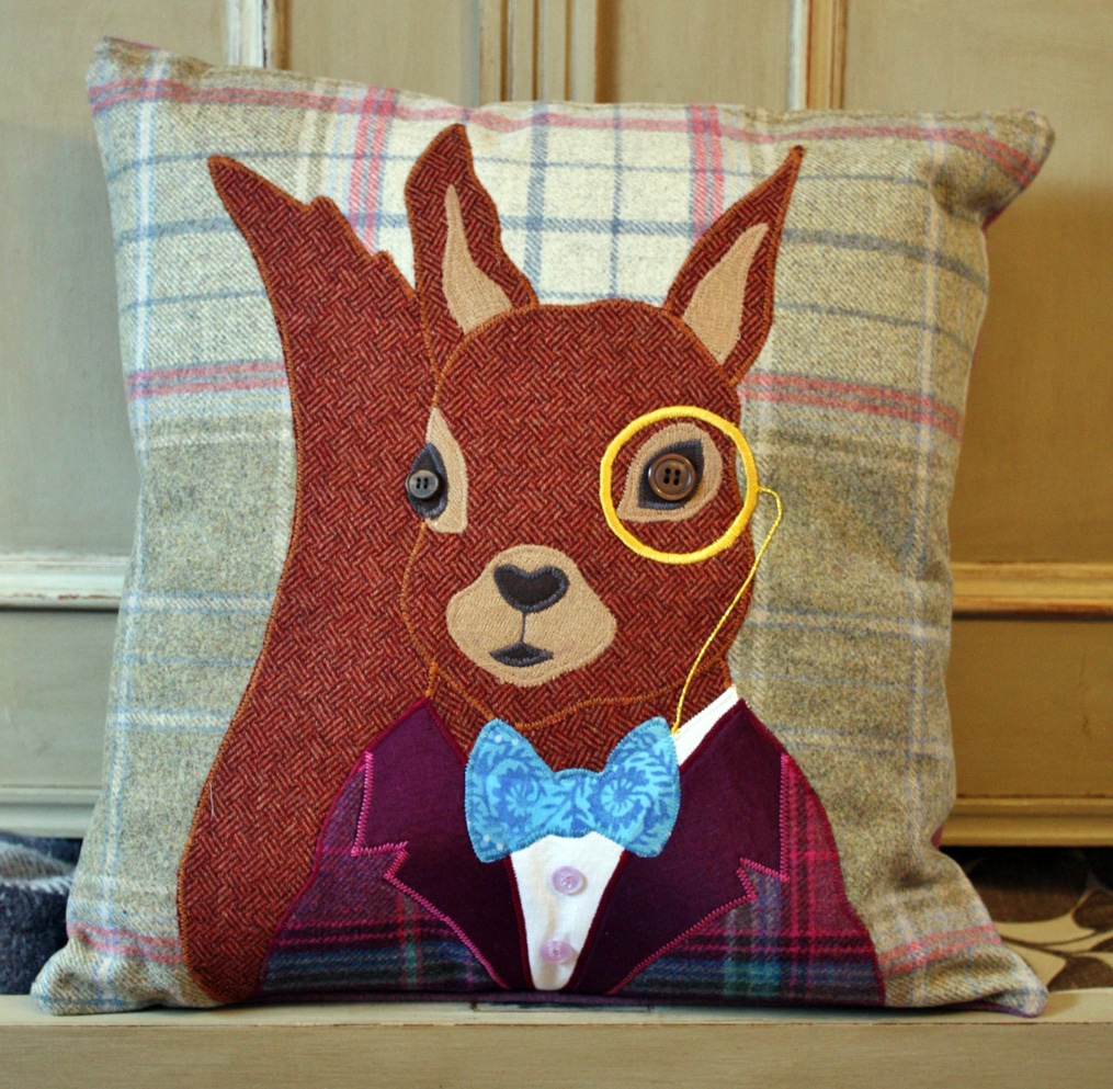 Red squirrel tweed cushion by Alexandra Stevens for The Cotswold Tailor