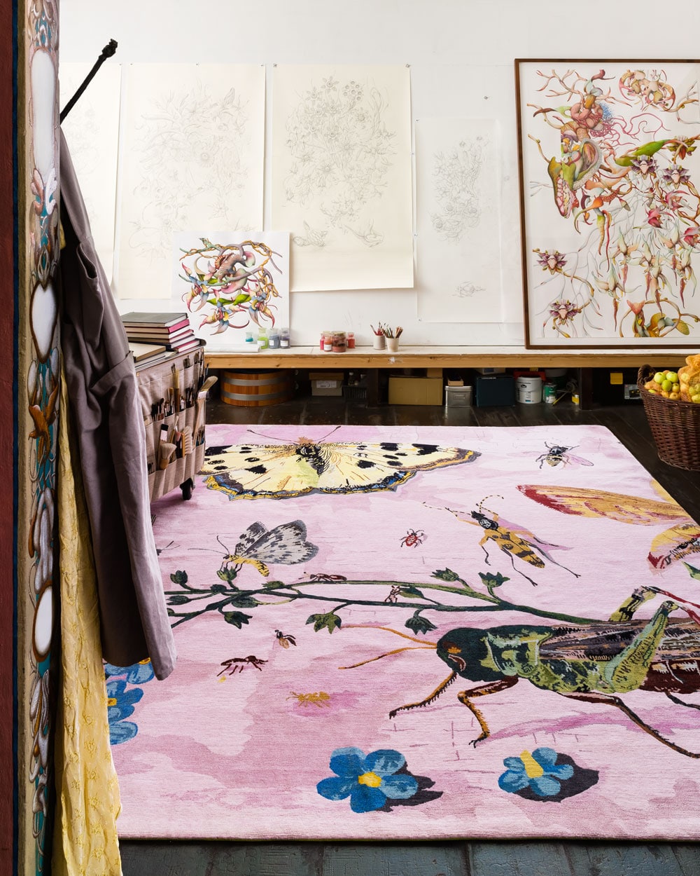 Four rooms defined by rugs 