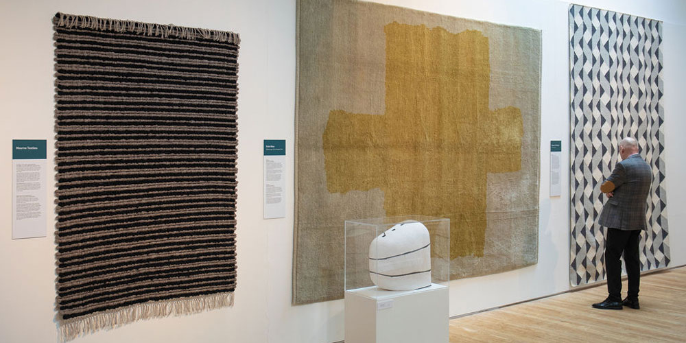 Installation shot of ‘Under Your Feet’ contemporary rugs on show at the Ruthin Craft Centre, north Wales, 6 April–14 July 2019.