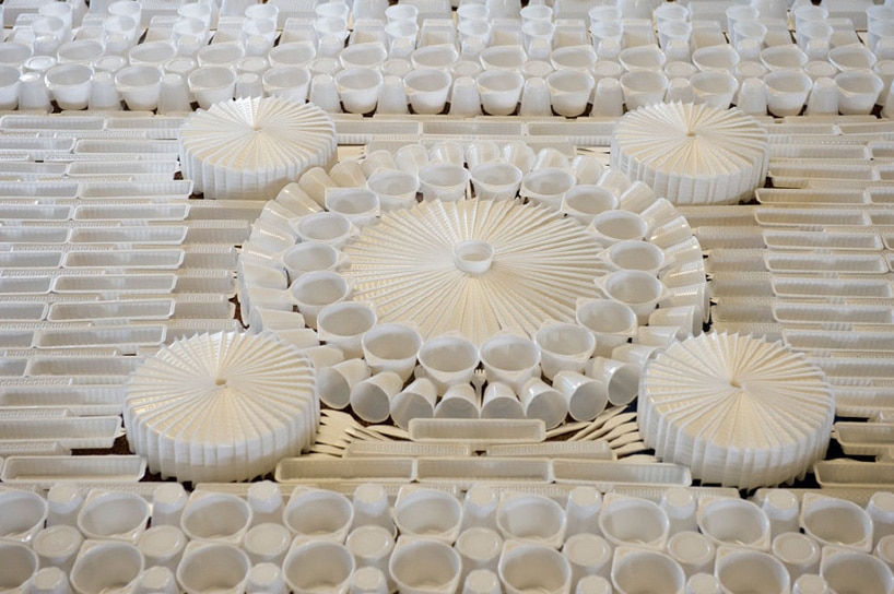 Plastic cups and cutlery make this carpet - Disposable Carpet - We Make Carpets